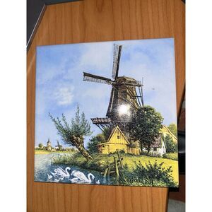 Hand decorated ceramic tile shows windmill motif 6" sq.